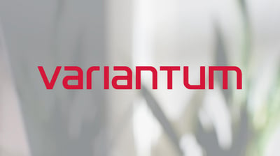 Variantum logo on top of a blurry background