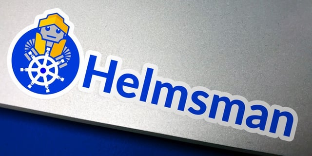 Logo of Helmsmann as a sticker on a laptop